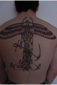 likod ng itim na Egyptian Anubis at pattern ng tattoo ng beetles ng ginto