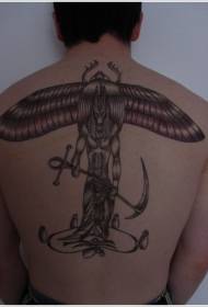 kumbuyo wakuda Egypt Anubis ndi golide kachilomboka tattoo