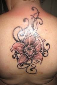 takana vaaleanpunainen orkidea ja viiniköynnösten tatuointikuvio
