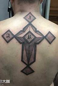 iphethini ye-back cross tattoo