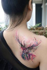 sievietes muguras krāsas vāveres tetovējuma modelis