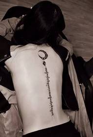 mode back strip Sanskrit tattoo