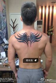 modello classico tatuaggio totem nero grigio posteriore