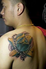 gwapo nga gwapa nga back lotus bead tattoo