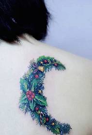 zeer unieke totemtattoo met kerstmaanboom