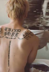 striking back and Sanskrit tattoo on the spine