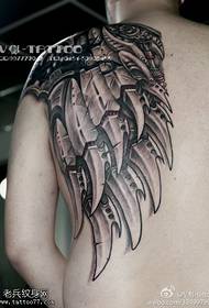 dominējošais mehāniskā spārnu tetovējuma raksts
