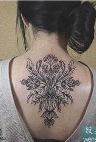 назад квітка татуювання візерунок