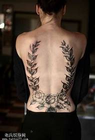 tilbage flot blomster tatoveringsmønster