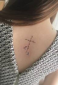 literary fan's back tattoo