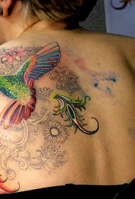 retour beau motif de tatouage de fleur colibri