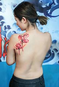 back A dazzling double flower tattoo