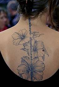 mujer luz de fondo tinta flores inglés tatuaje
