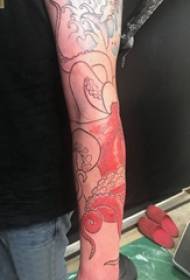 Patrón de tatuaxe de polbo Cadro de tatuaxe de polbo pintado no brazo do neno