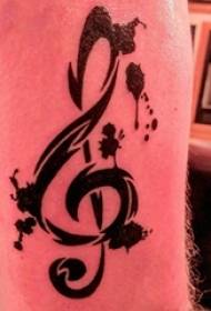 Lámh nóta ceoil tattoo lámh cailín ar phictiúr tattoo nóta dubh