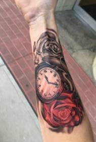 Υλικό τατουάζ βραχίονα, αρσενικό βραχίονα, τριαντάφυλλο και ρολόι τατουάζ εικόνα