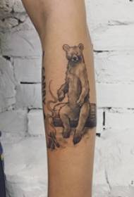 Tatuatge de braç material de dibuixos animats de nen a la imatge de tatuatge d'ós de dibuixos negres