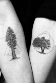 手の木は、幾何学的で大きな木のタトゥーの写真に少年の腕を入れ墨します
