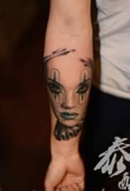 Abstrakt karakter arm tatovering