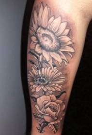 Solros tatuering bild pojke arm på svart blomma tatuering bild