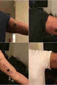 U bracciu di u tatuu geomitricu nantu à u quadru di u tatuatu