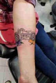 Motorcycle tattoo girl arm on flower and motorcycle tattoo picture