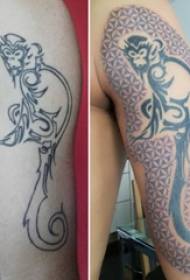 Maschera del tatuaggio della scimmia del ragazzo sull'immagine del tatuaggio della scimmia del braccio