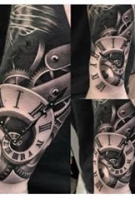 Tattoo timepiece black gray tattoo clock picture on boy's arm