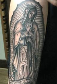 Arm tattoo picture boy's arm on black buddha tattoo picture