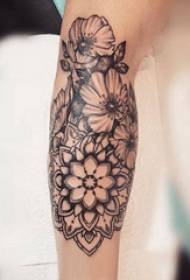 Flower tattoo boy's arm on black flower tattoo picture