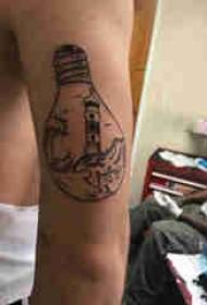 Minimalist line tattoo male student arm on lighthouse and bulb tattoo picture