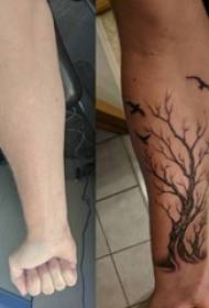 Tatuointi oksia pojan käsivarsi mustalla tuhka tatuointi oksa kuva
