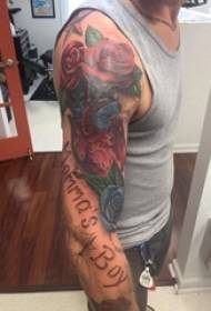 Ang braso ng Rose tattoo na lalaki sa rosas na larawan ng tattoo