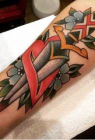 Arm tattoo material, male heart, heart at dagger tattoo na larawan
