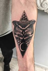 Tattoo owl boy with arms on rhombus and owl tattoo pictures