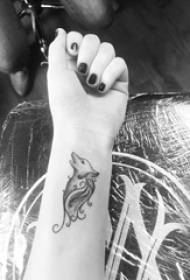 Wrist tattoo on the girl fox tattoo picture on the girl's arm