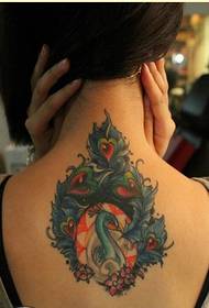 vroulike rugmode redelik goed- lyk kleurvolle peacock tattoo prentjie