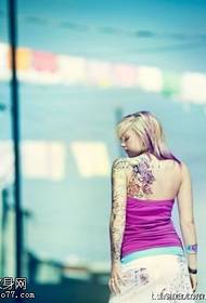 two gorgeous and delicate flower tattoo designs