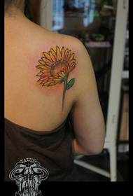 Γυναίκα πίσω ηλιέλαιο δουλειά τατουάζ