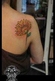 Tatuaggio girasole donna sul retro