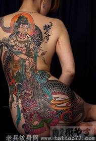 Vrouw rug Guanyin Tha Teng tattoo foto waardering