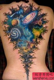 Woman back star tattoo work