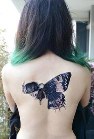 szépség vissza törés pillangó tetoválás kép