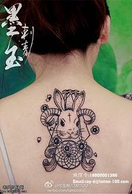 cartone animato posteriore coniglio cattura Immagine del tatuaggio della rete da sogno