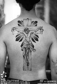 Besimi dhe devotshmëria bashkëjetojnë me modelin e tatuazhit të kryqëzimit