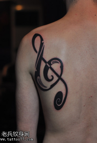 Mažas šviežios asmenybės nugaros muzikos simbolio totemo tatuiruotės modelis
