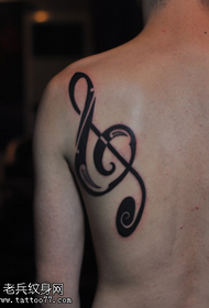 Small fresh personality back music symbol totem tattoo pattern