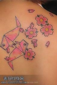 Piccoli tatuaggi di prugne posteriori freschi