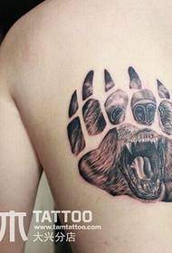 Tatuaggio della copertura del tatuaggio della stampa dell'orso palma