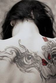 meisje terug totem abstract tattoo foto